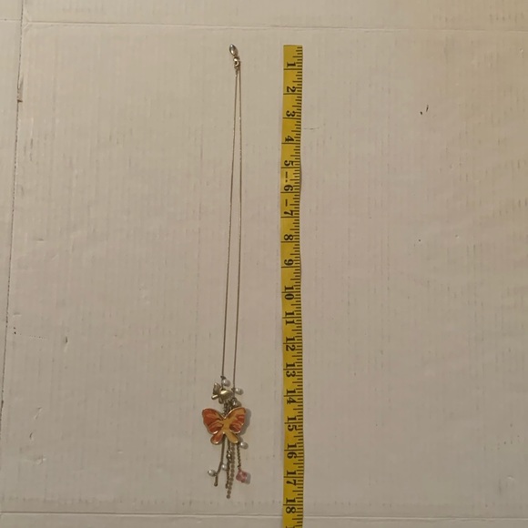 Women’s Gold Color Guess Love Necklace with Butterfly Pendant - Picture 7 of 10